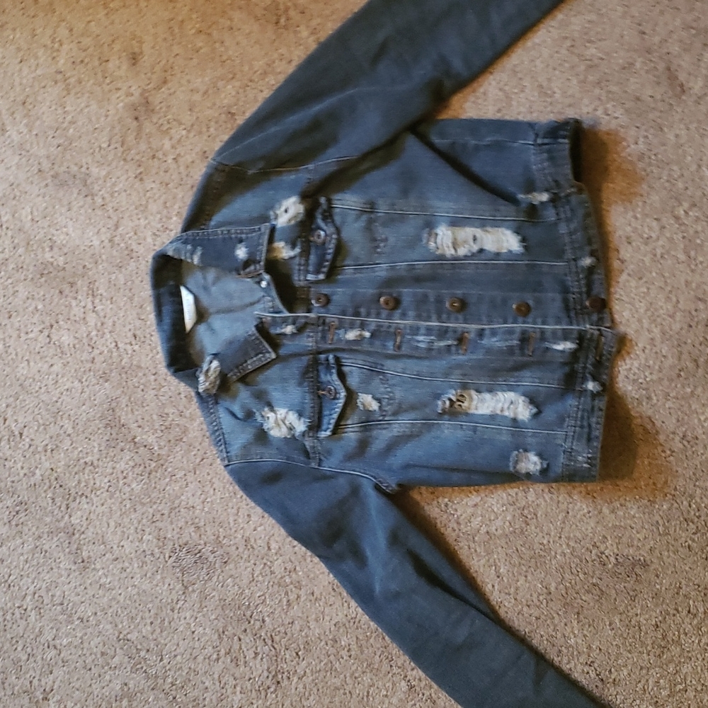 Ripped denim jacket